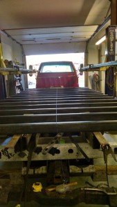 New box beam frame is welded into place.